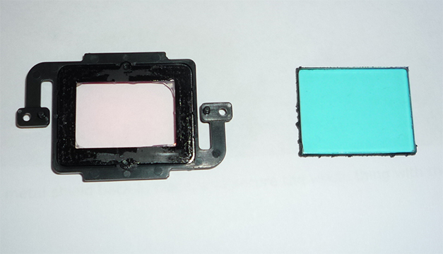 New filter in bracket next to old filter. Note how blue it is!