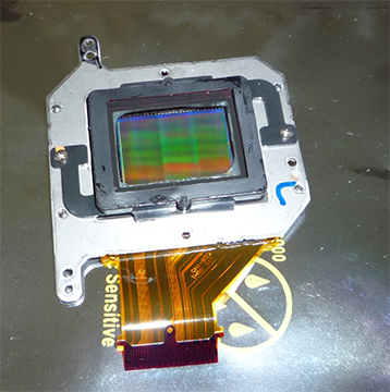 New filter attached to sensor. Note glue in corners!