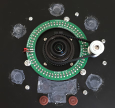 The focus mechanism and heater ring.