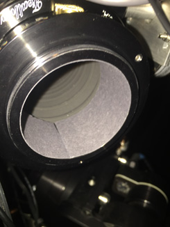 Using matt black card as a temporary solution to conceal the refective surface of the focuser endcap.